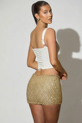 Embellished Low-Rise Mini Skirt in Gold