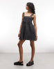 The Ragged Priest Godet Panel Denim Mini Dress In Charcoal