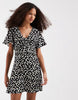 Vero Moda Easy Joy Short Sleeve Bow Front Mini Dress In Black Ditsy Daisy Print