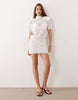 Noughts & Kisses Lace High Neck Padded Shoulder Mini Dress In White