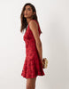 Lace Mini Dress With Flippy Hem In Red